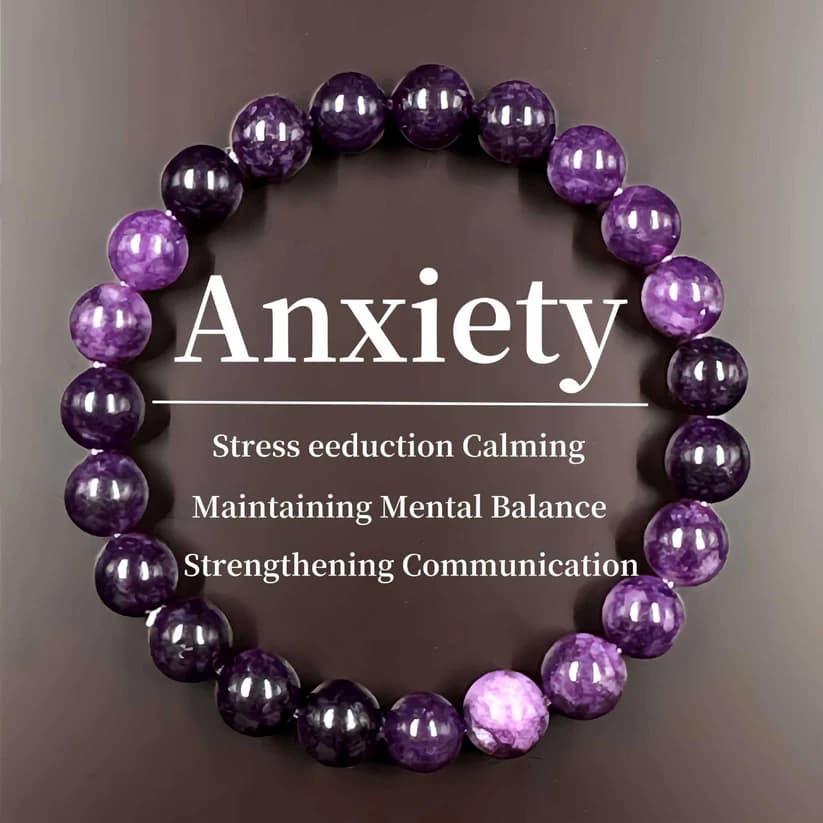 Purple beaded bracelet with text about anxiety relief, stress reduction, and maintaining mental balance.