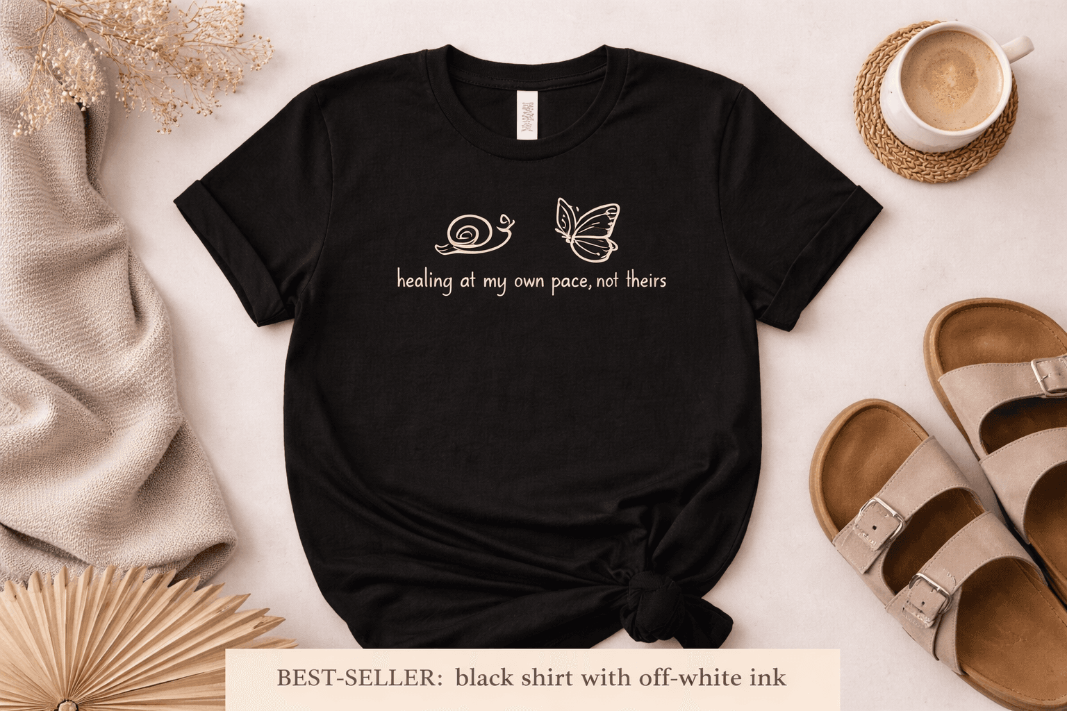 Black t-shirt with snail, butterfly, and text "healing at my own pace, not theirs".